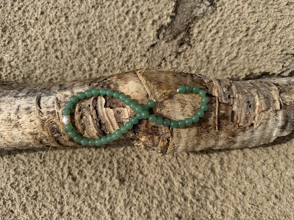 Handmade green aventurine necklace by elsket Brisbane on driftwood