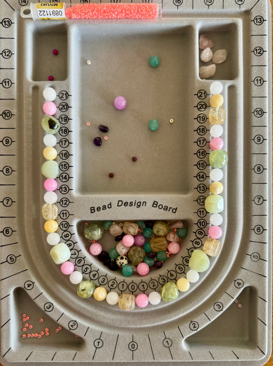 Handmade necklace being designed on a bead board at elsket Brisbane workshop