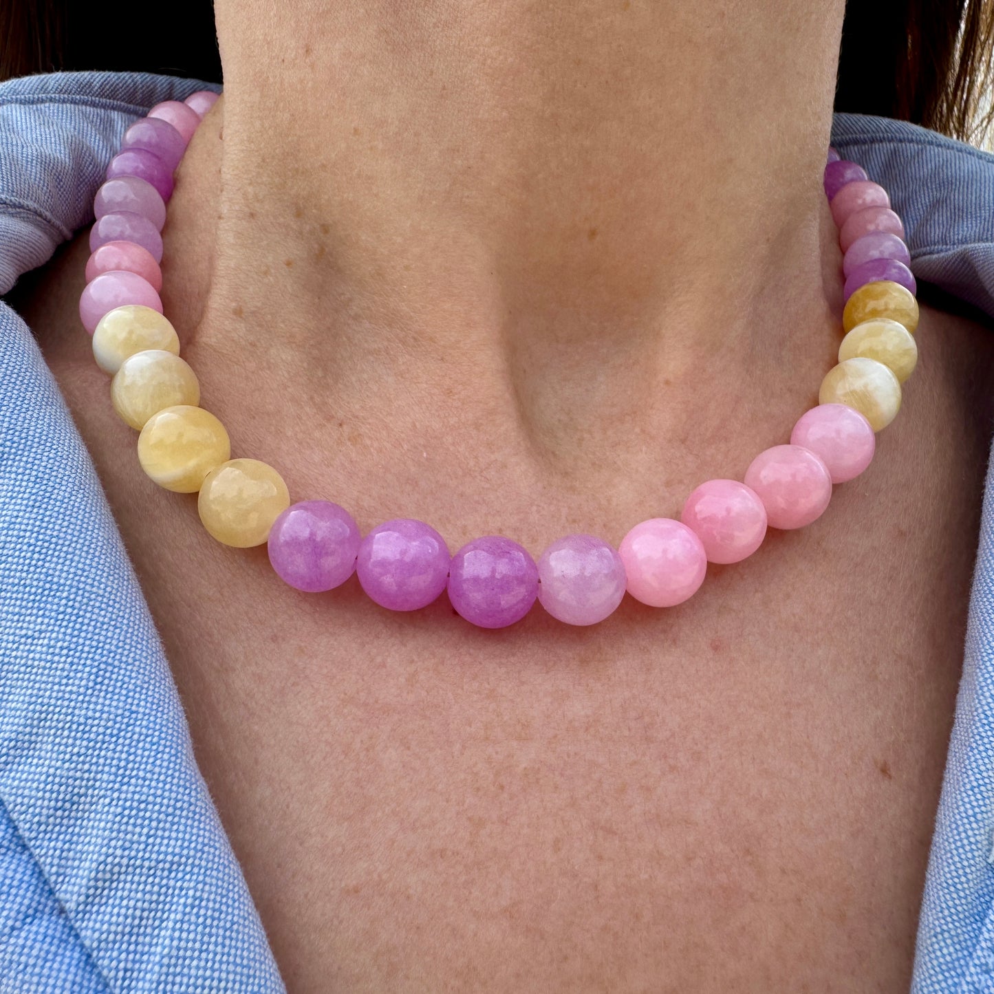 Pink and honey statement necklace worn at the collarbone, handmade by elsket